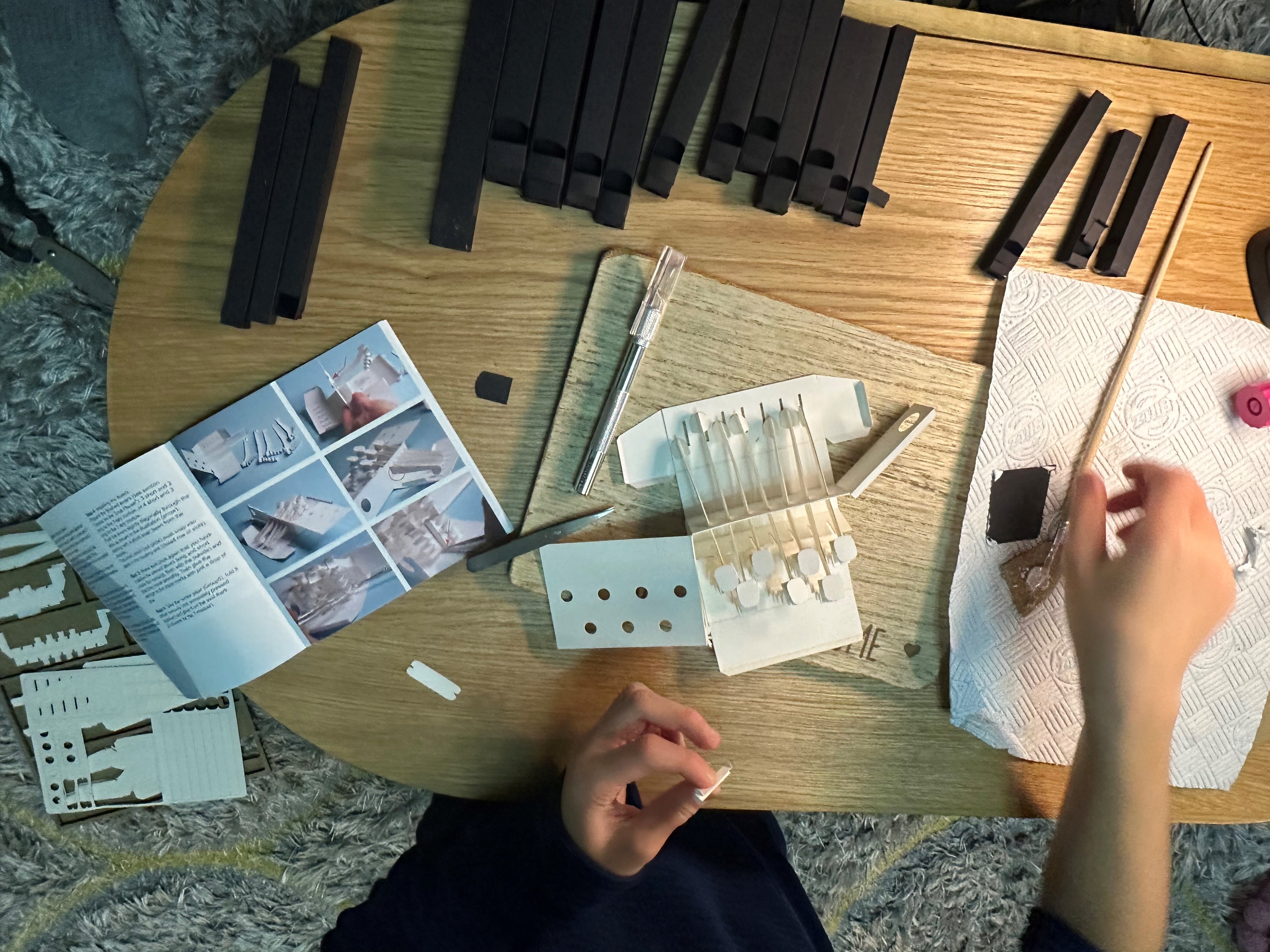 Paper organ kit components laid out